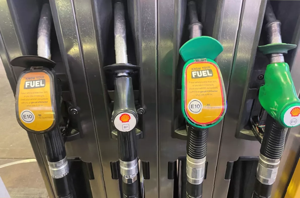 A close-up of a fuel pump display showing the price per litre in pence