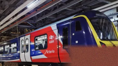 A modern Arterio train in red, white and blue Great British Railways livery at a station platform