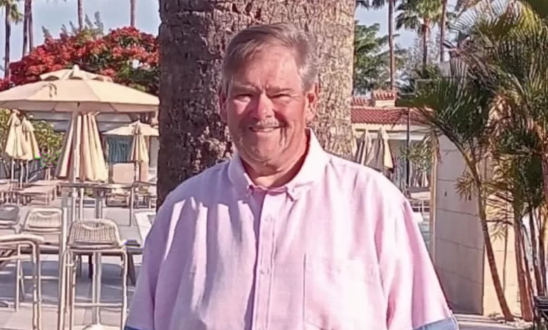 A patient wearing a small wearable mini-pump device attached discreetly to their body at home