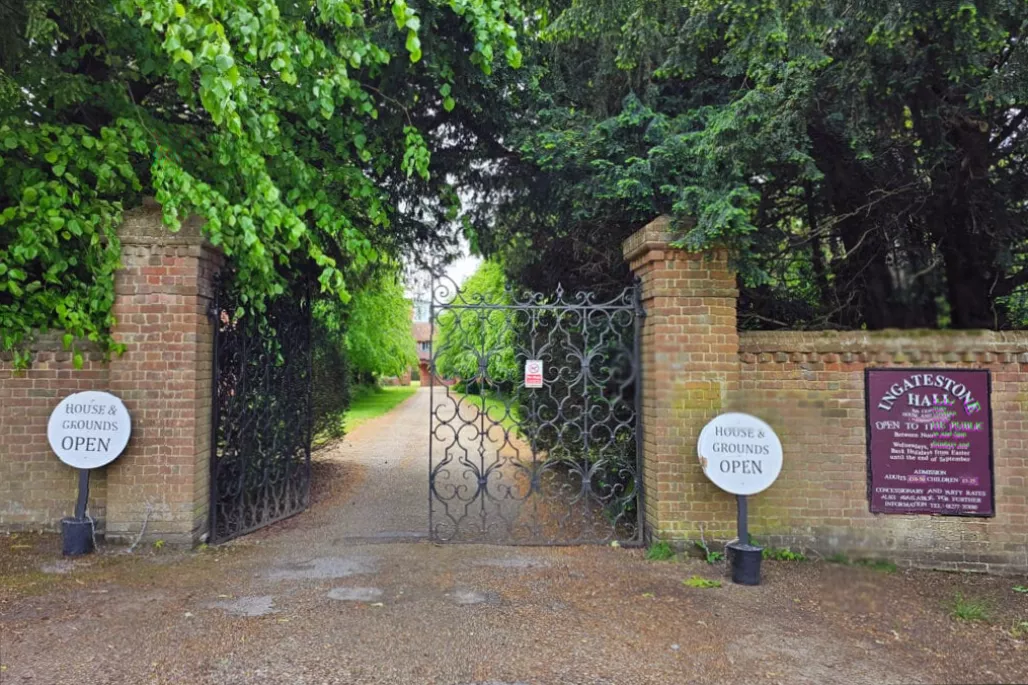 Enclosed lawn and walled garden surrounding a 16th-century English stately home