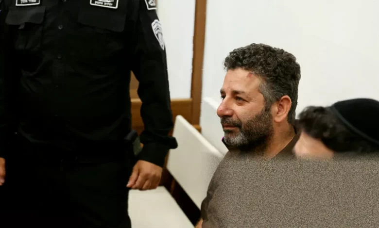 Activists being led into an Israeli court building in Ashkelon.