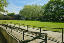 Crowds gathered at Jubilee Gardens park along the Thames for the Boat Race finish line view