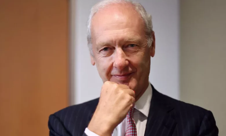 Fund manager analysing stock performance data on digital screens