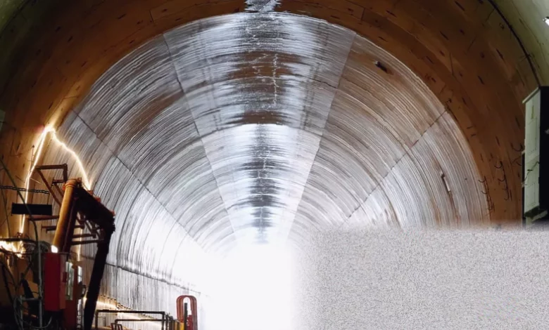 Construction workers on a high-speed rail viaduct in the English countryside