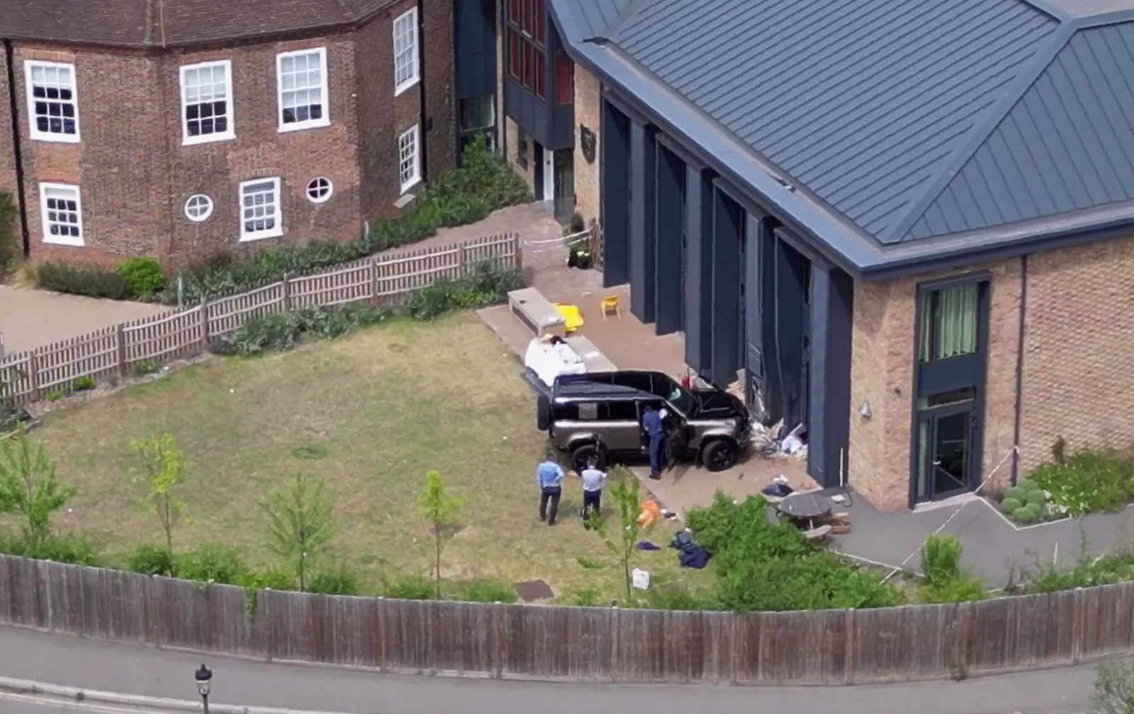 A Land Rover vehicle being removed from the site of the Wimbledon primary school crash