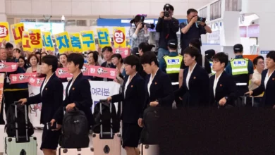 North Korean football delegation arriving at Incheon International Airport via a commercial flight from Beijing