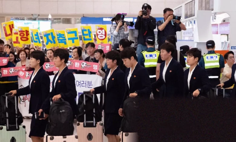North Korean football delegation arriving at Incheon International Airport via a commercial flight from Beijing