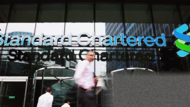 Exterior of a Standard Chartered bank branch in a UK city centre