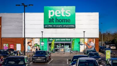 Exterior of a Pets at Home store with a pet care sign on a high street