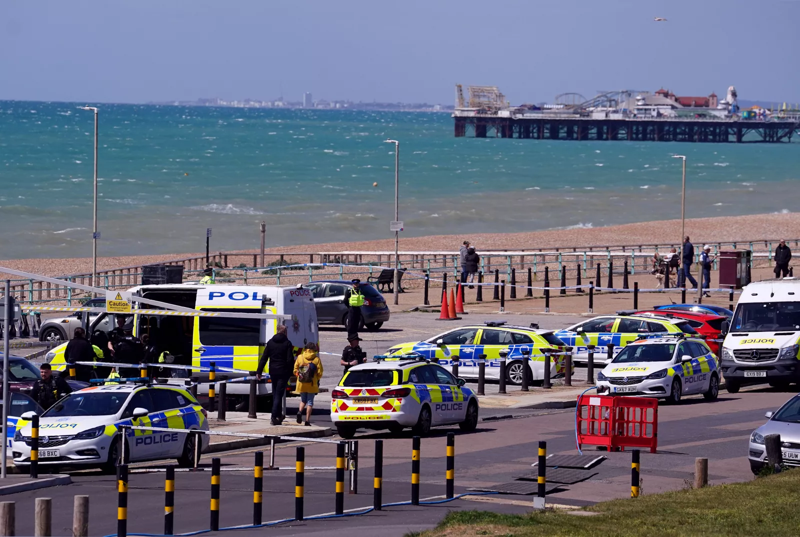 Tape cordons off Brighton beach east of Volk's Railway car park during police investigation