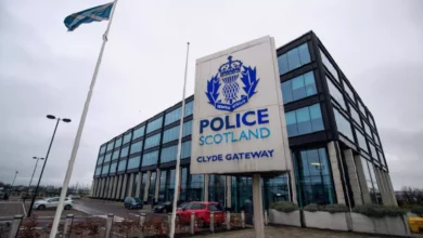 Police Scotland officers outside a government building in Edinburgh