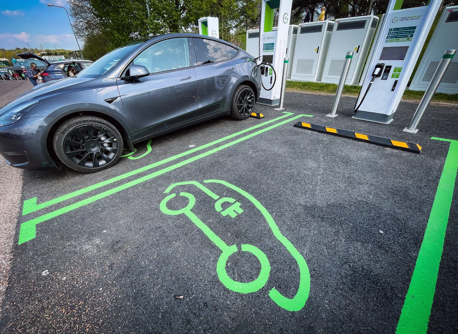 A map of the UK highlighting rural constituencies versus urban areas with charging station density marked