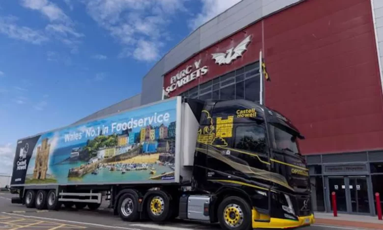 Parc y Scarlets stadium exterior with food supplier branding visible