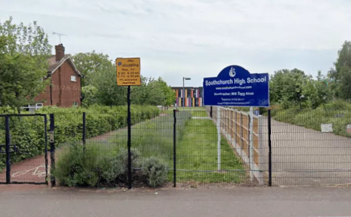 A school entrance sign for University Academy Long Sutton amid ongoing student boycotts and parental concerns.