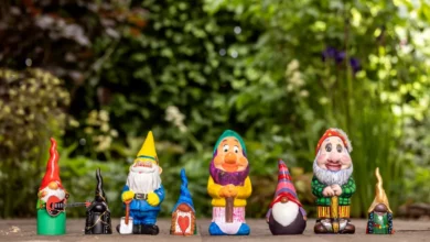 Chelsea Flower Show flowerbed featuring celebrity-painted garden gnomes