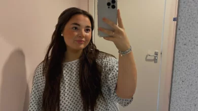 Young woman in a hospital bed receiving intravenous chemotherapy treatment