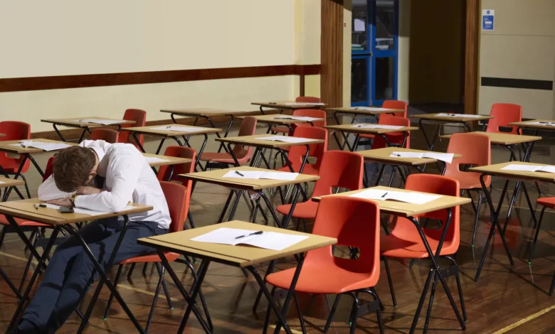 Students leaving a school exam hall after a challenging maths test