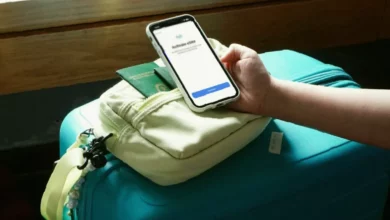 Traveller using a smartphone travel app to plan a holiday itinerary