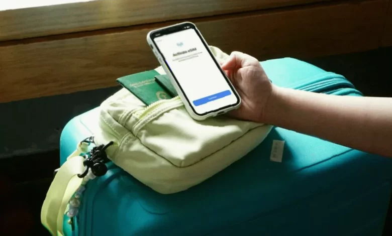 Traveller using a smartphone travel app to plan a holiday itinerary
