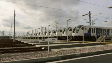 Heathrow Airport rail terminal with passengers boarding a Heathrow Express train