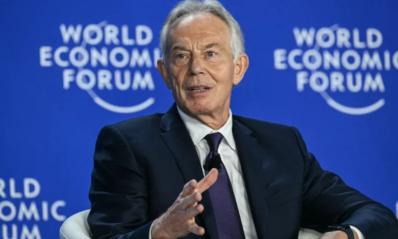 Sir Tony Blair speaking at an energy policy event in a European conference hall