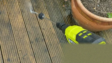Patio slabs being cleaned with a pressure washer jet