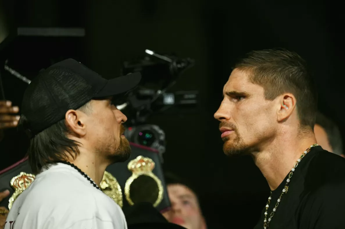 Weigh-in scales showing Verhoeven at 258.7 pounds, significantly heavier than Usyk