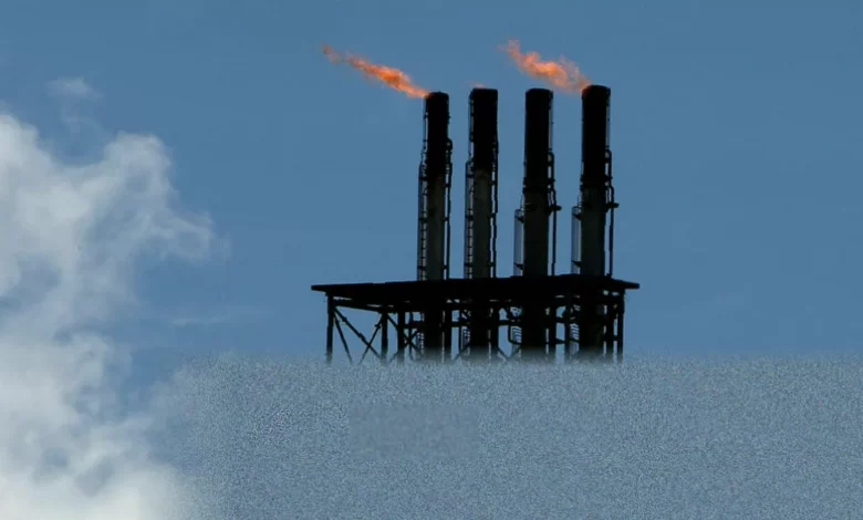 LNG export facilities and industrial stacks along the Western Australian coastline