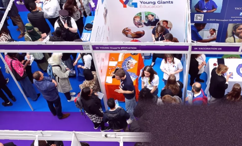 A crowded job centre waiting area in a UK city, with young people queuing at service counters