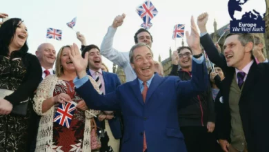 Political correspondents reflecting on referendum night results in a newsroom