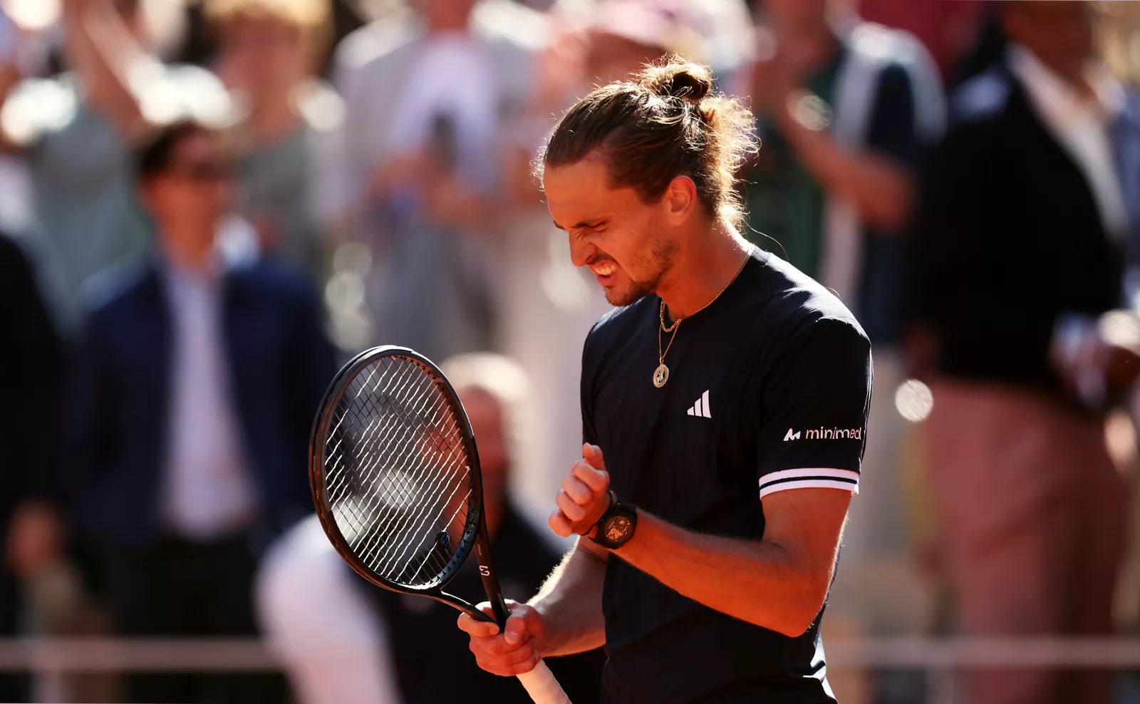 Crowd reacting during a tense five-set men's singles final