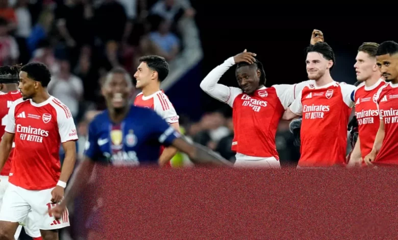 Arsenal and PSG players line up for a penalty shootout in the Champions League final in Budapest.