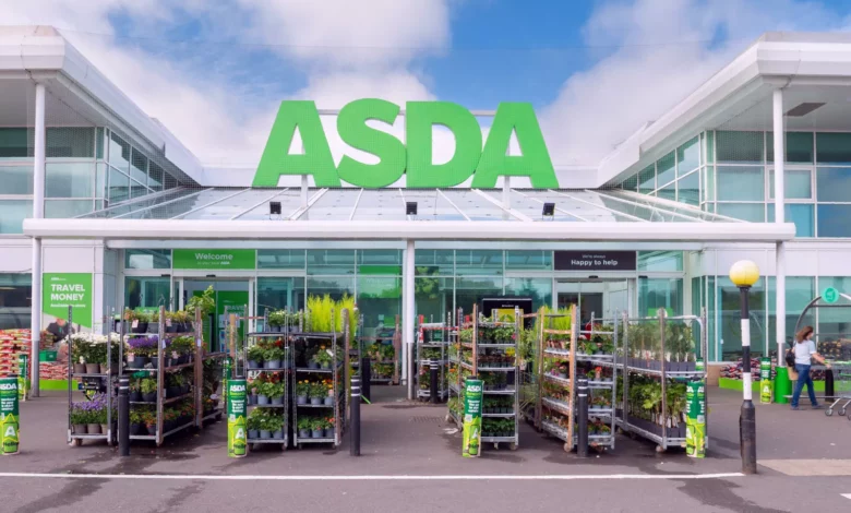 Exterior view of an Asda supermarket on a cloudy day with shoppers entering