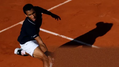 Felix Auger-Aliassime serving during his fourth-round victory at Roland Garros