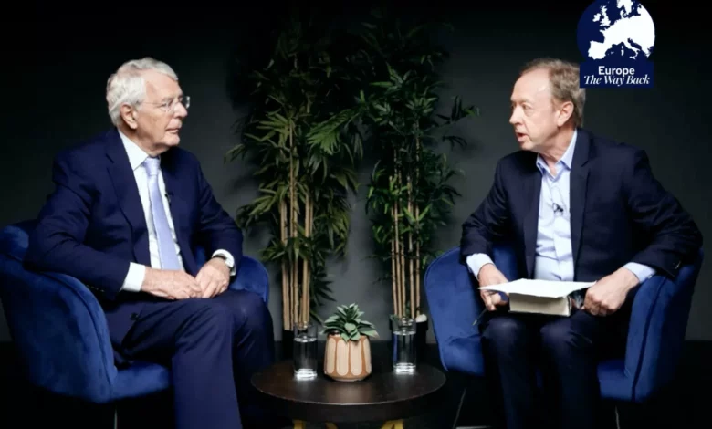 Sir John Major speaking at a talk with Geordie Greig for a newspaper campaign