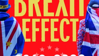 Hardback book titled The Brexit Effect on a wooden table