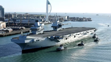 Aircraft carrier docked at a Norwegian port after technical fault
