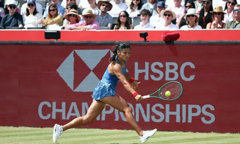Queen’s Club grass court during the women’s singles final with a player serving.