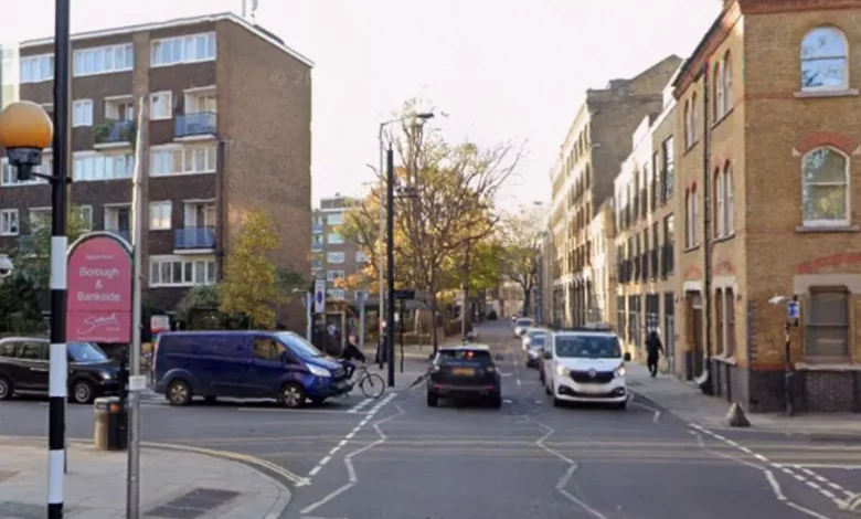 An unmarked black Volvo police car at the scene of a crash on Long Lane in Bermondsey