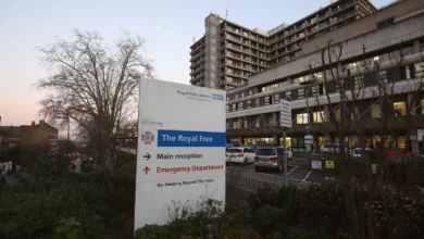 Exterior view of a North London NHS hospital building on a cloudy day