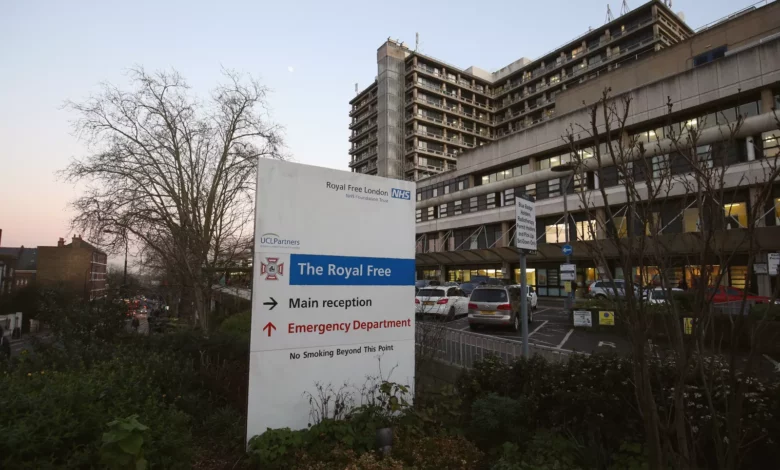 Exterior view of a North London NHS hospital building on a cloudy day