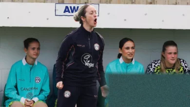 Forest Green Rovers women’s team playing a match in their green and black striped kits