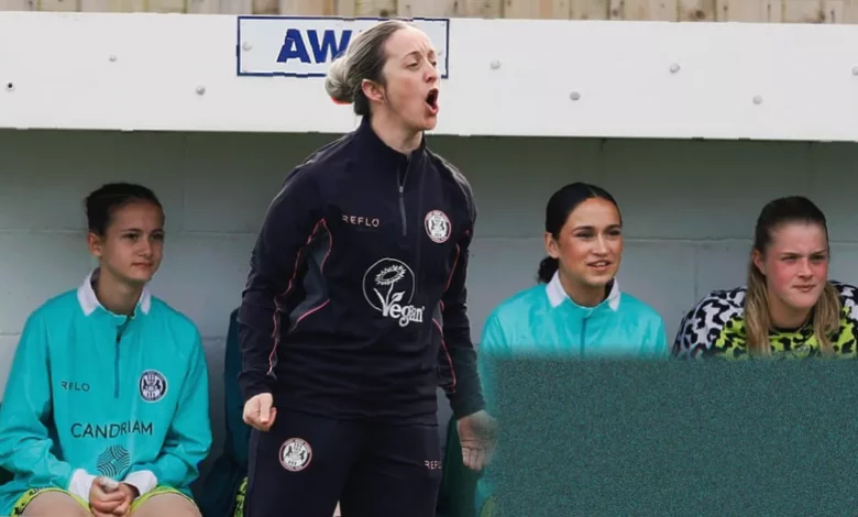 Forest Green Rovers women’s team playing a match in their green and black striped kits