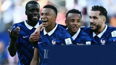 French players celebrating a goal during a World Cup match against Senegal