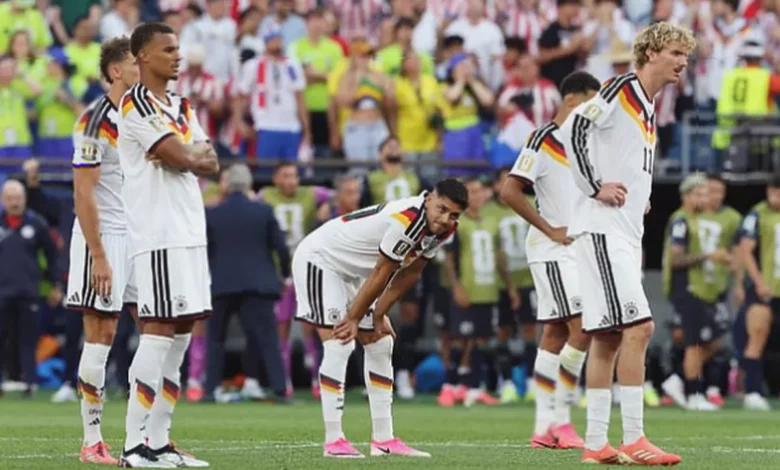 Germany players walking off the pitch after a World Cup penalty shoot-out defeat