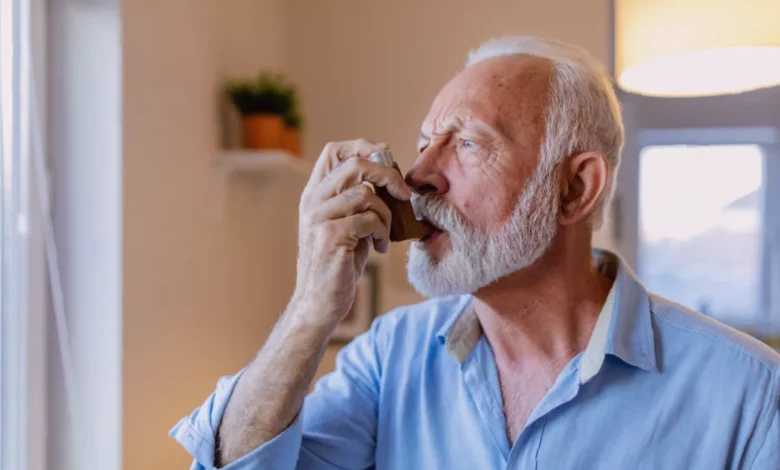 Person using an inhaler device in a clinical setting
