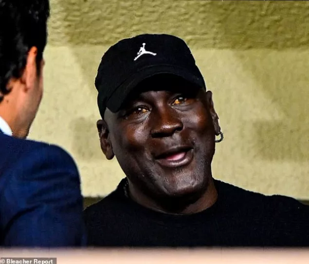 Michael Jordan and Yvette Prieto strolling hotel grounds in Marbella