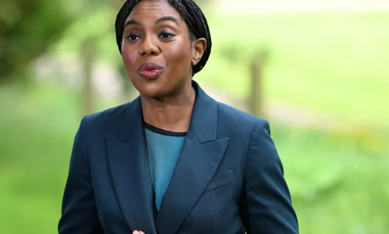 A woman speaks at a podium in the House of Commons chamber