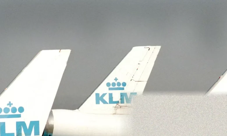 Cabin crew speak to a wheelchair user during boarding on a long-haul flight