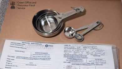 Police evidence photos of Le Creuset cookware items purchased with embezzled SNP funds